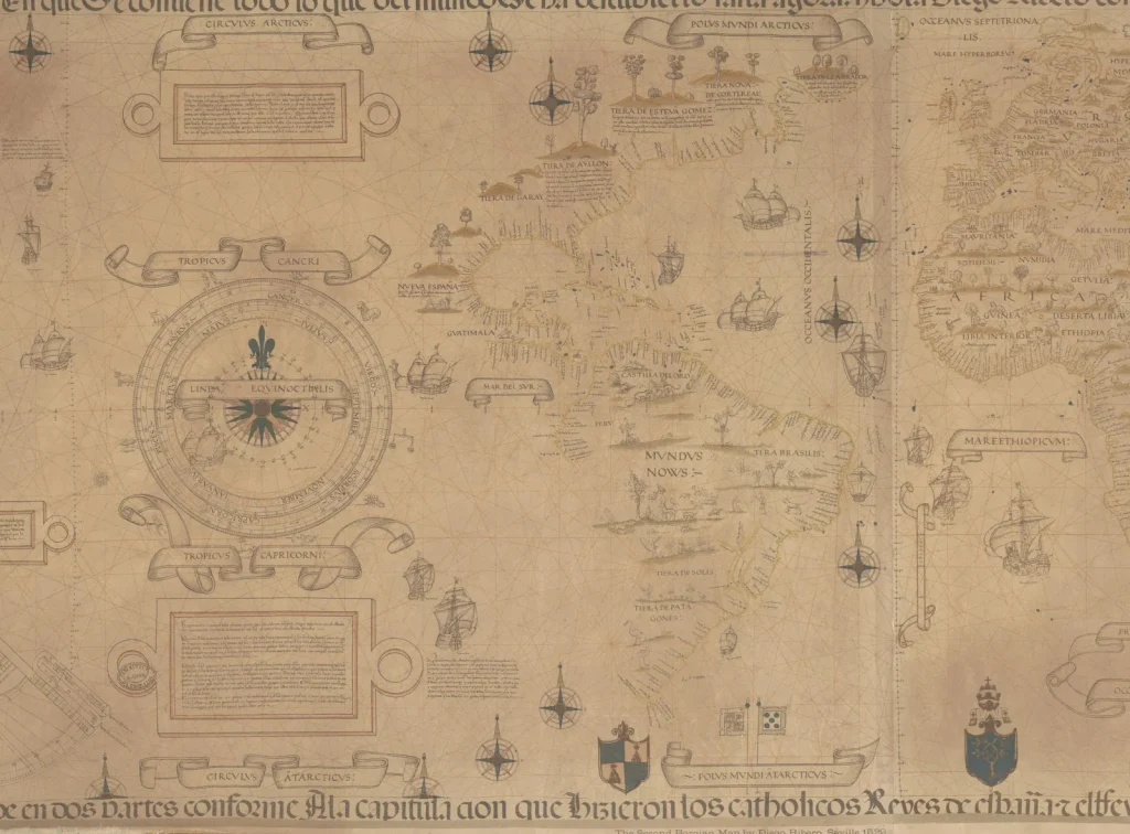 Diogo Ribeiro's 1529 world chart showing the Atlantic, the Americas, Europe and Africa with ships, compass roses and ornate banners